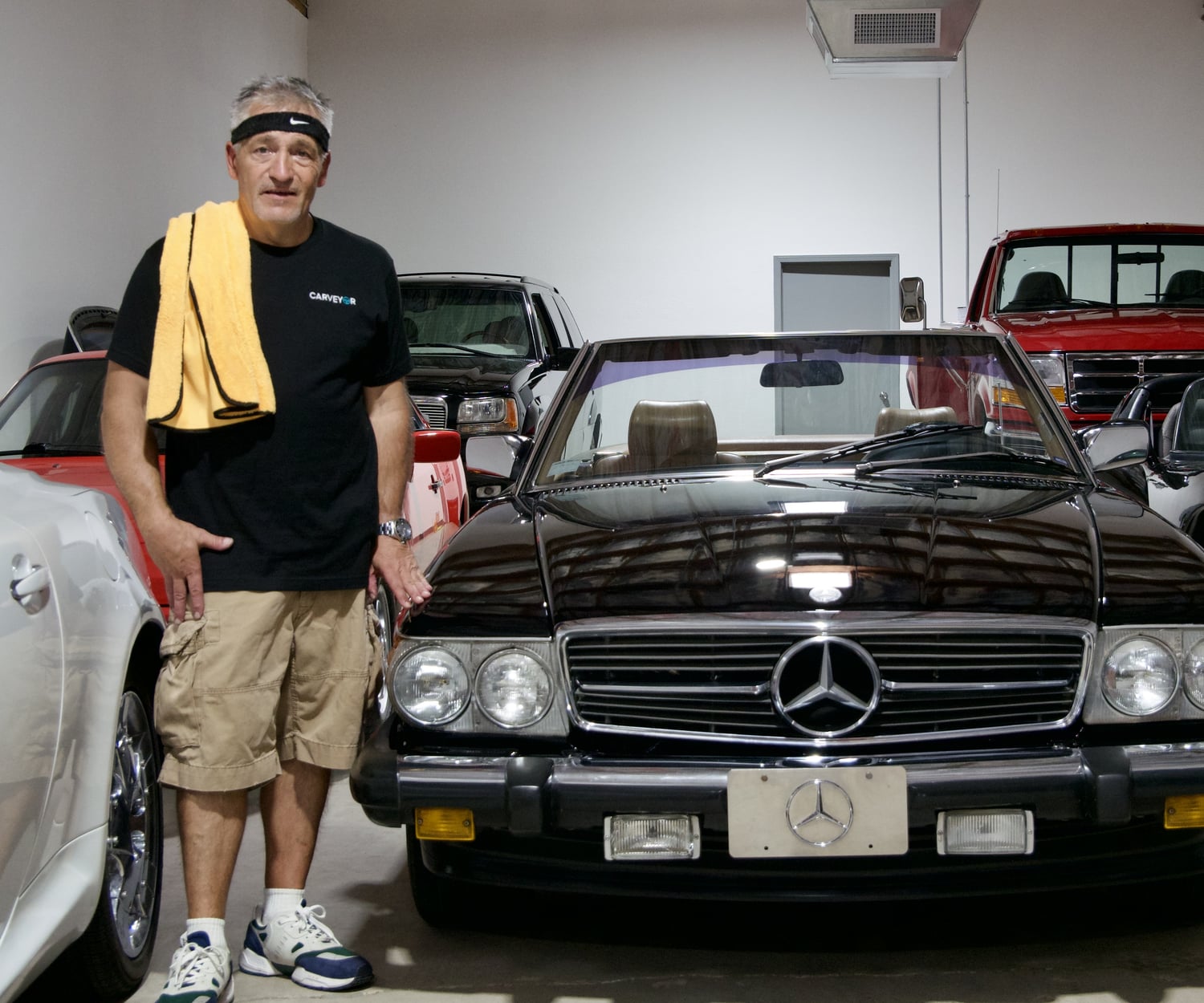 Mike, CarVeyor's in-house paint-correction and detailing specialist, in the showroom
